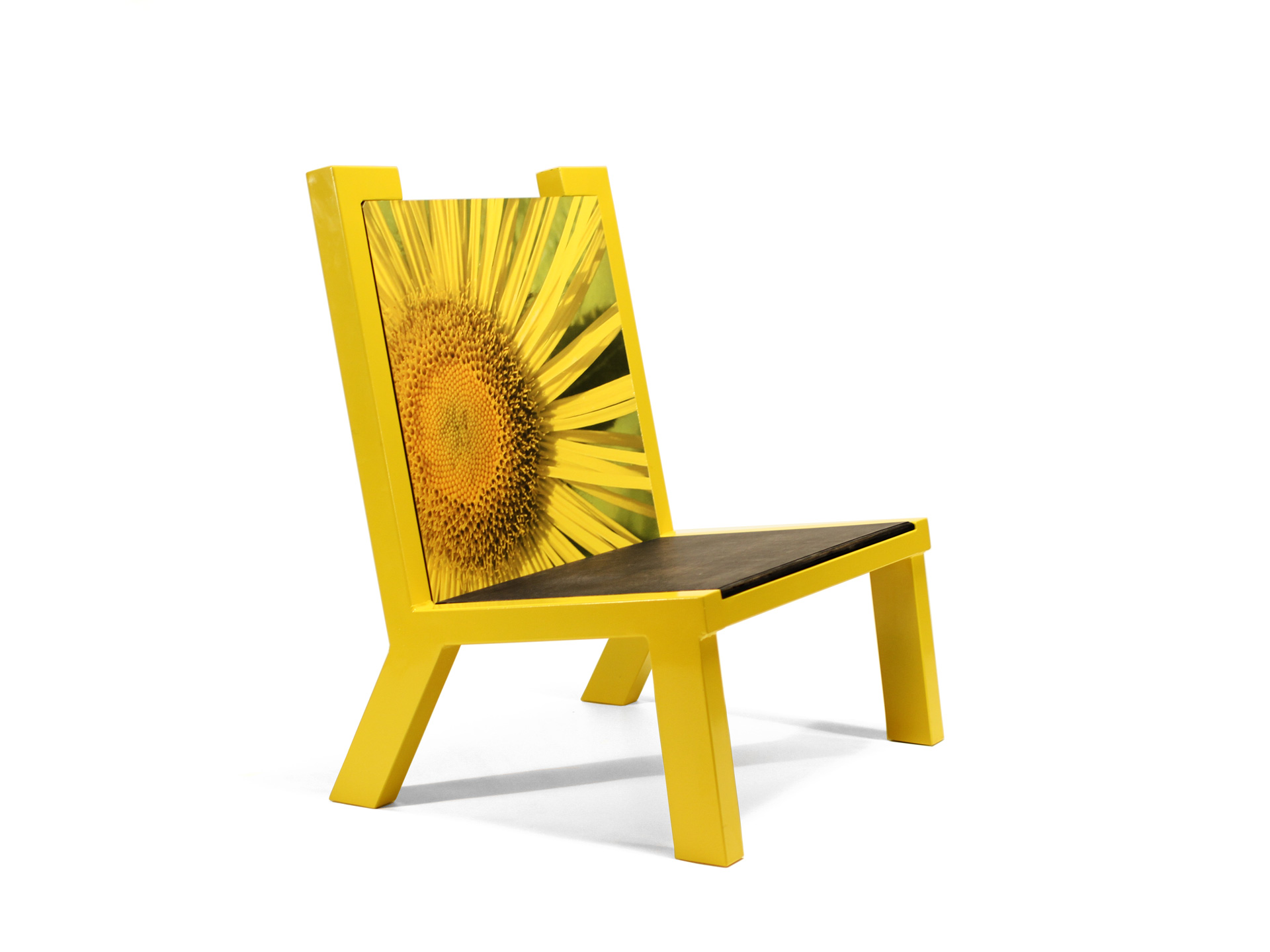 Camelback chair in yellow shown from the front