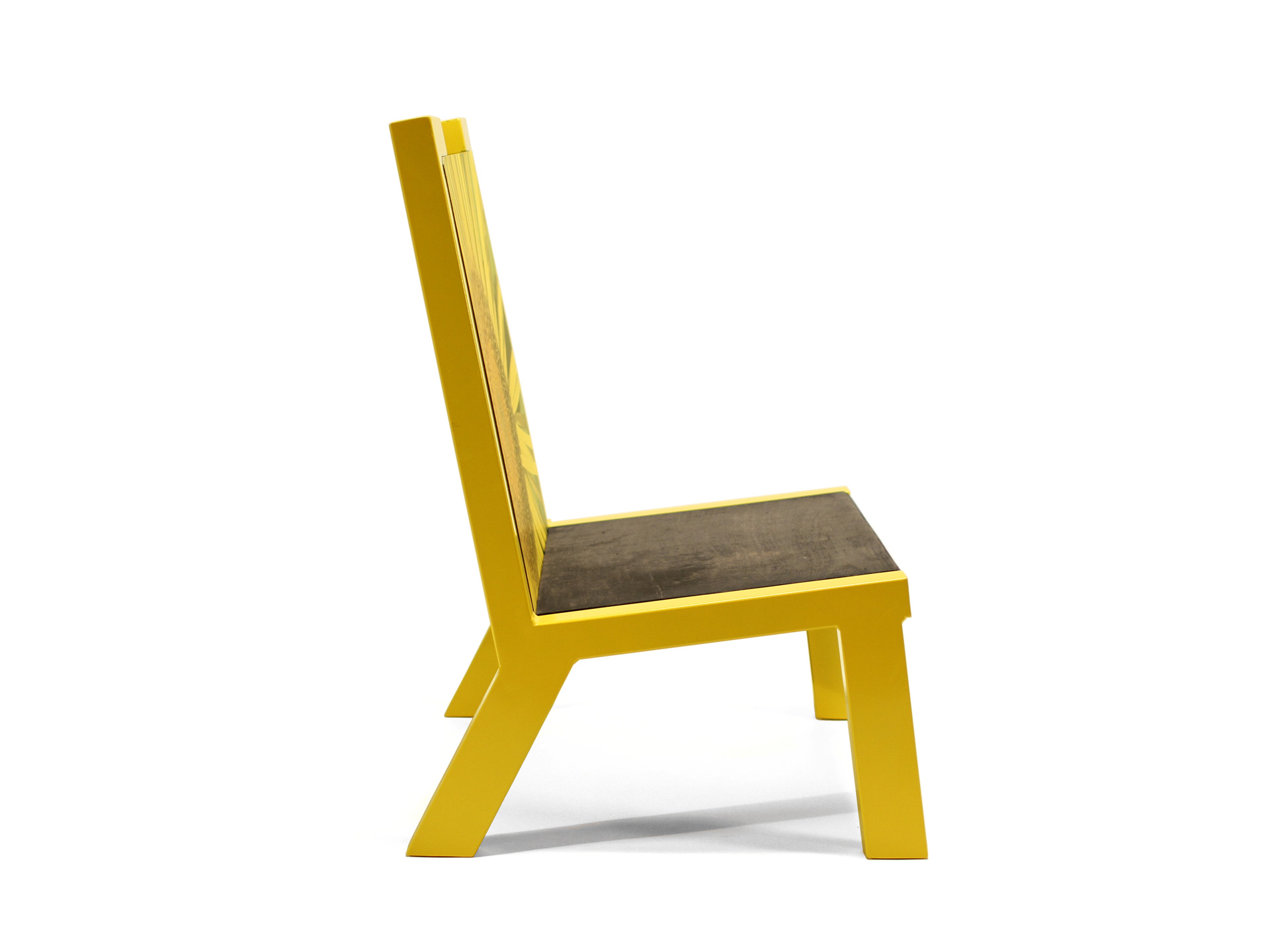 Camelback chair in yellow shown from the side