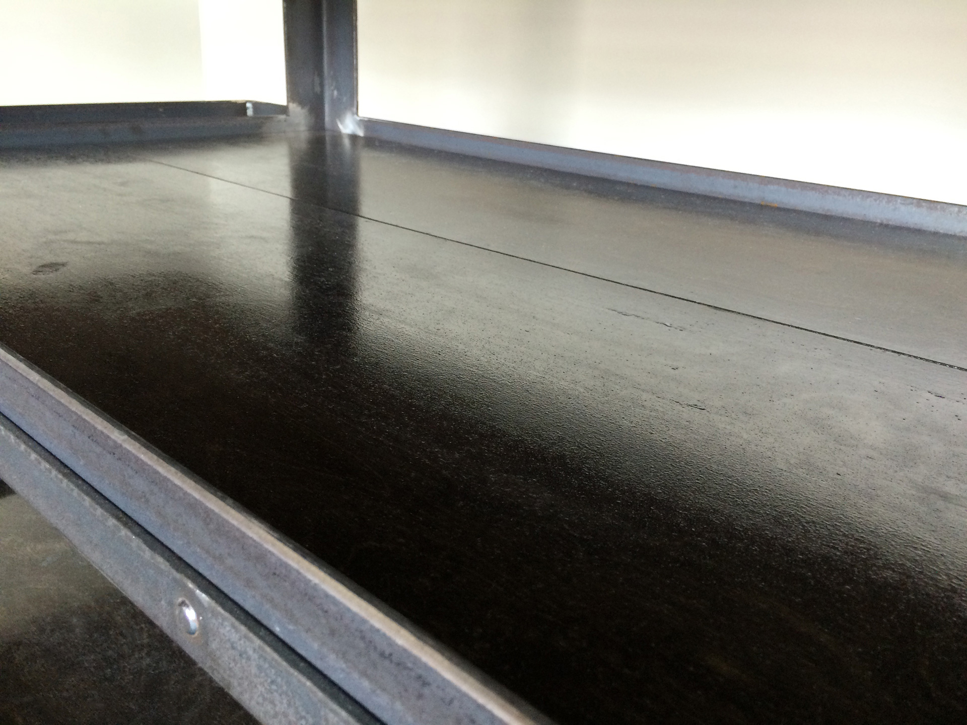 Detail of bottom shelf surface on Kitchen Island and Bar